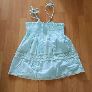 Light blue lace design top with strap ties